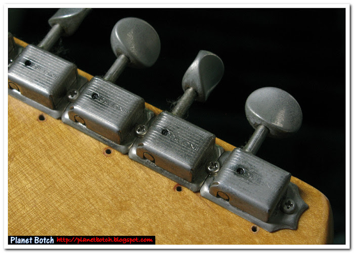 Rear of headstock showing tuners have been replaced