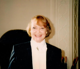 Daphne Neville playing a receptionist 