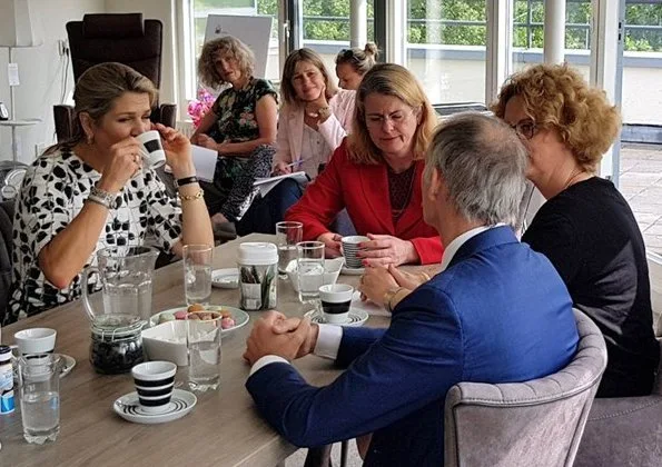 Queen Maxima wore Carolina Herrera Leaf Print Tweed Half Sleeve Dress. Dutch Queen Máxima visited iZi-Experience home The Hague