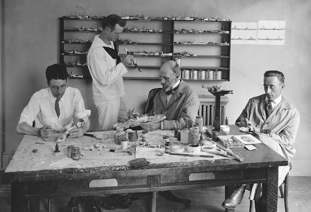 Experimenting with dazzle camouflage patterns. Original caption: Experiments on models of vessels to illustrate various methods of camouflage on different types of ships. Camouflage department, U.S. Navy, Washington, DC.