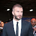 David Beckham, 43, continues to display his thicker and darker locks at Paris car show... amid 'hair transplant' rumours