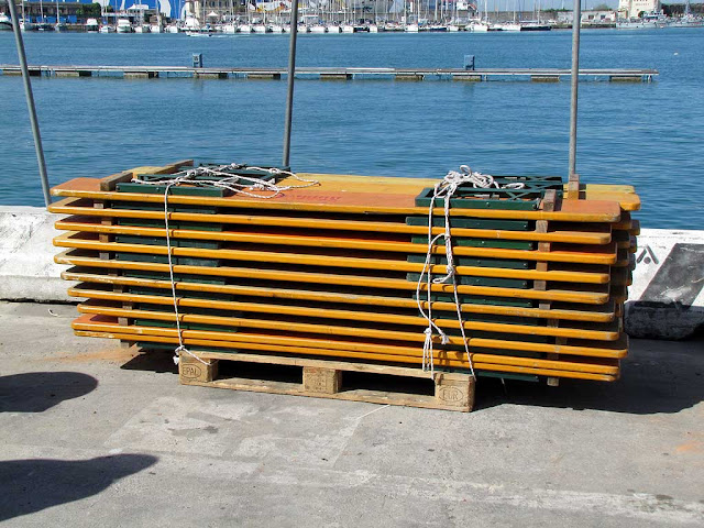Stack of folded benches, Porto Mediceo, Livorno
