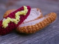 http://www.ravelry.com/patterns/library/mini-hot-dog-cat-toy
