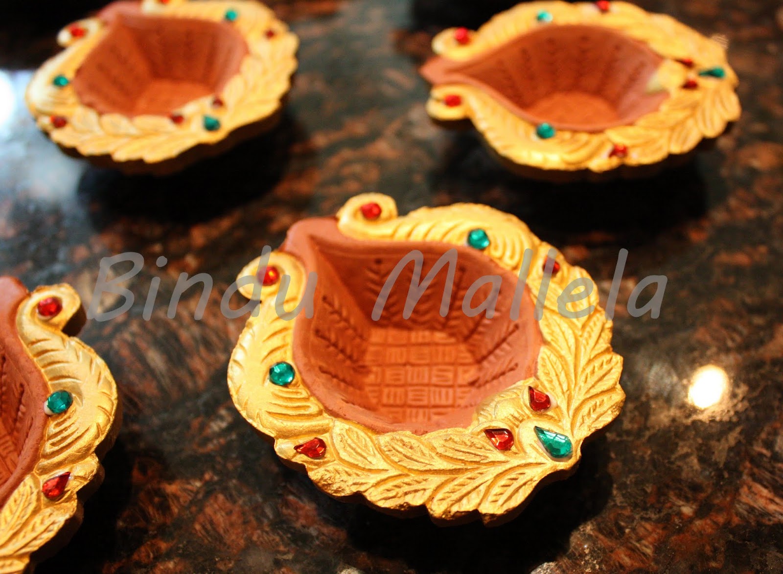 crazy for colors! Diyas for Diwali return gifts...