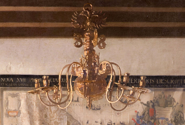 Close-up view of chandelier and the double-headed eagle at the top—symbolic of the Habsburg Empire that controlled the Burgundy region (Southern Netherlands & Belgium). Photo: WikiMedia.org.