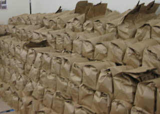 Bags of food packed and stacked on pallets, Sunnyvale Community Services, Sunnyvale, California