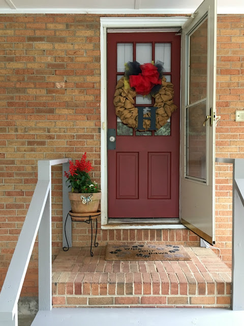 See what a difference paint made to our exterior stairs and side door!