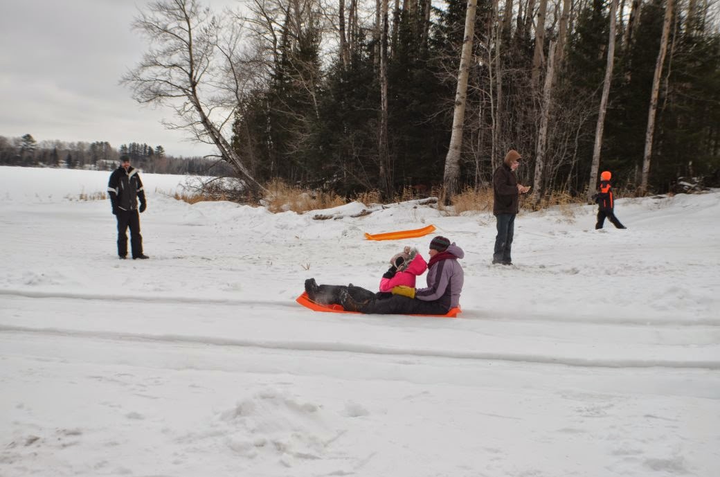 Mother and Daughter sledding (Photo by Trisha Field)