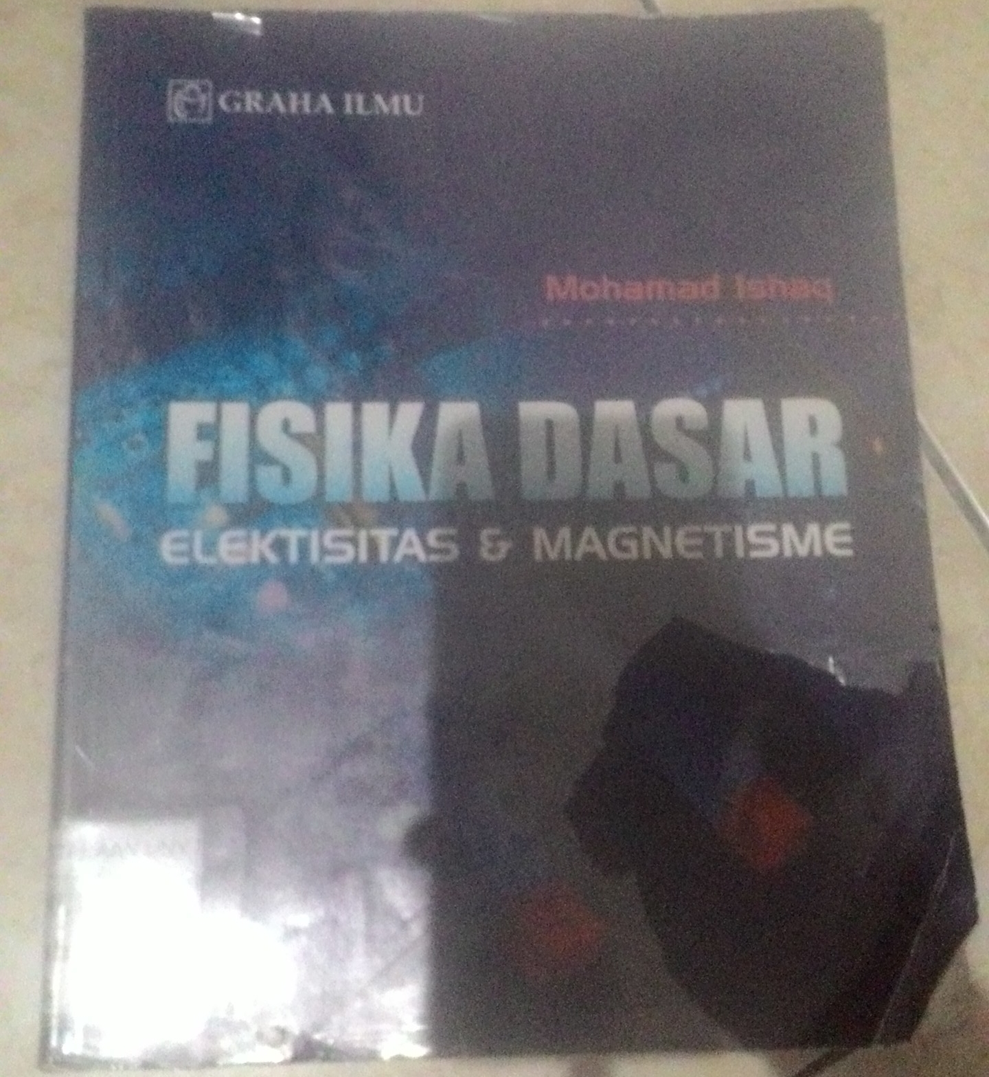 Resensi Buku Fisika Dasar Elektisitas Magnetisme