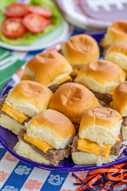 Cheeseburger Sliders - only 5 ingredients!! Ground beef, sausage, ranch dressing mix, cheese and buns. PERFECT for tailgating and parties!! Can make ahead of time and heat in the oven or on top of the grill when ready to serve. Top with your favorite burger toppings - lettuce, tomato, bacon, pickles, mayo, ketchup, mustard. SO easy and SOOOO good!!! Seriously our favorite burger recipe! #tailgating #burgers #beef #partyfood Cheeseburger Sliders - only 5 ingredients!! Ground beef, sausage, ranch dressing mix, cheese and buns. PERFECT for tailgating and parties!! Can make ahead of time and heat in the oven or on top of the grill when ready to serve. Top with your favorite burger toppings - lettuce, tomato, bacon, pickles, mayo, ketchup, mustard. SO easy and SOOOO good!!! Seriously our favorite burger recipe! #tailgating #burgers #beef #partyfood