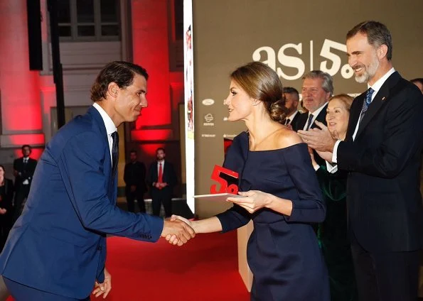 King Felipe. Queen Letizia wore DELPOZO flower embellished long-sleeved dress at As Sports Awards