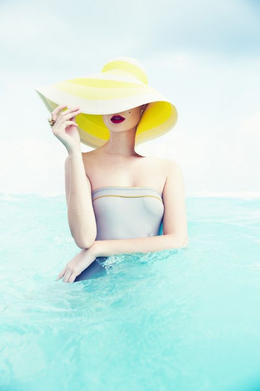 YELLOW HAT SUMMER GIRL OCEAN FASHION EDITORIAL