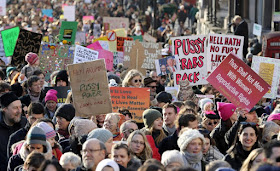 women worldwide march in protest at Donald Trump 
