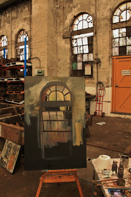 Plein air oil painting of windows in the interior of the Large Erecting Shop in the Eveleigh Railway Workshops painted by industrial heritage artist Jane Bennett