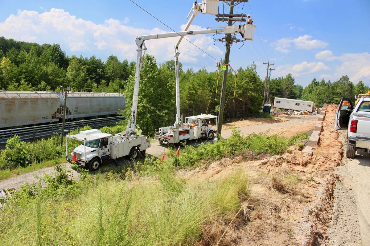 MEC&F Expert Engineers Two Danville, Virginia utility workers, David