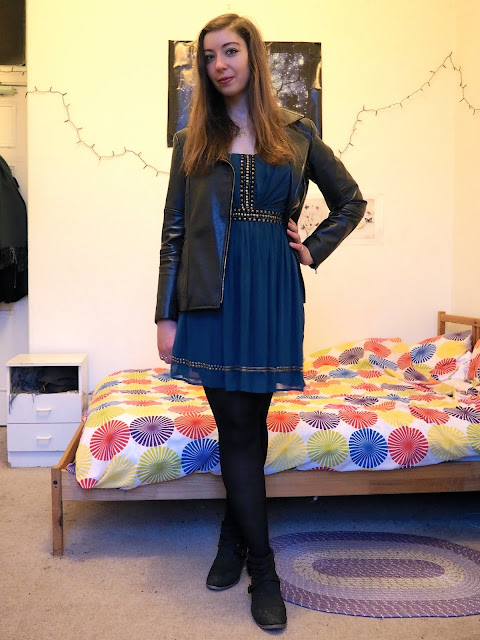 Merida inspired Disneybound outfit of short teal party dress with black leather jacket, tights and ankle boots