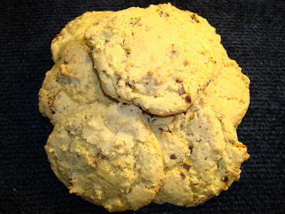 COCONUT AND CHOCOLATE SHAVINGS COOKIES PORTIONS: 32 Cookies INGREDIENTS ¼ lb. butter, unsalted 1½ cup sugar 7 egg yolks 1 tsp. vanilla extract 2¾ cups all purpose flour 1 tsp. baking soda 1 tsp. cream of tartar 1 cup coconut 2 tsp. orange zest ¾ cups chocolate shavings PREPARATION Cream butter, sugar, egg yolks and vanilla until is fluffy. In a separate bowl whisk together, flour, baking soda, cream of tartar. Add the mix flour, coconut, orange zest, chocolate shavings to the creamed butter and mix well. In a cooking tray with parchment paper or sprayed with cooking oil scoop out the dough with a tablespoon. Preheat the oven at 350° F - 176° C. Bake the cookies for about 15 minutes, at that time the cookies should start to get a little brown on top . Do not over cook.