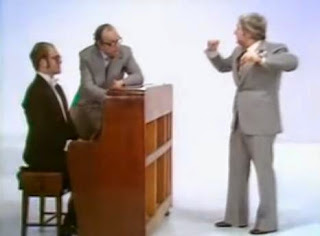 Morecambe and Wise, and Elton John