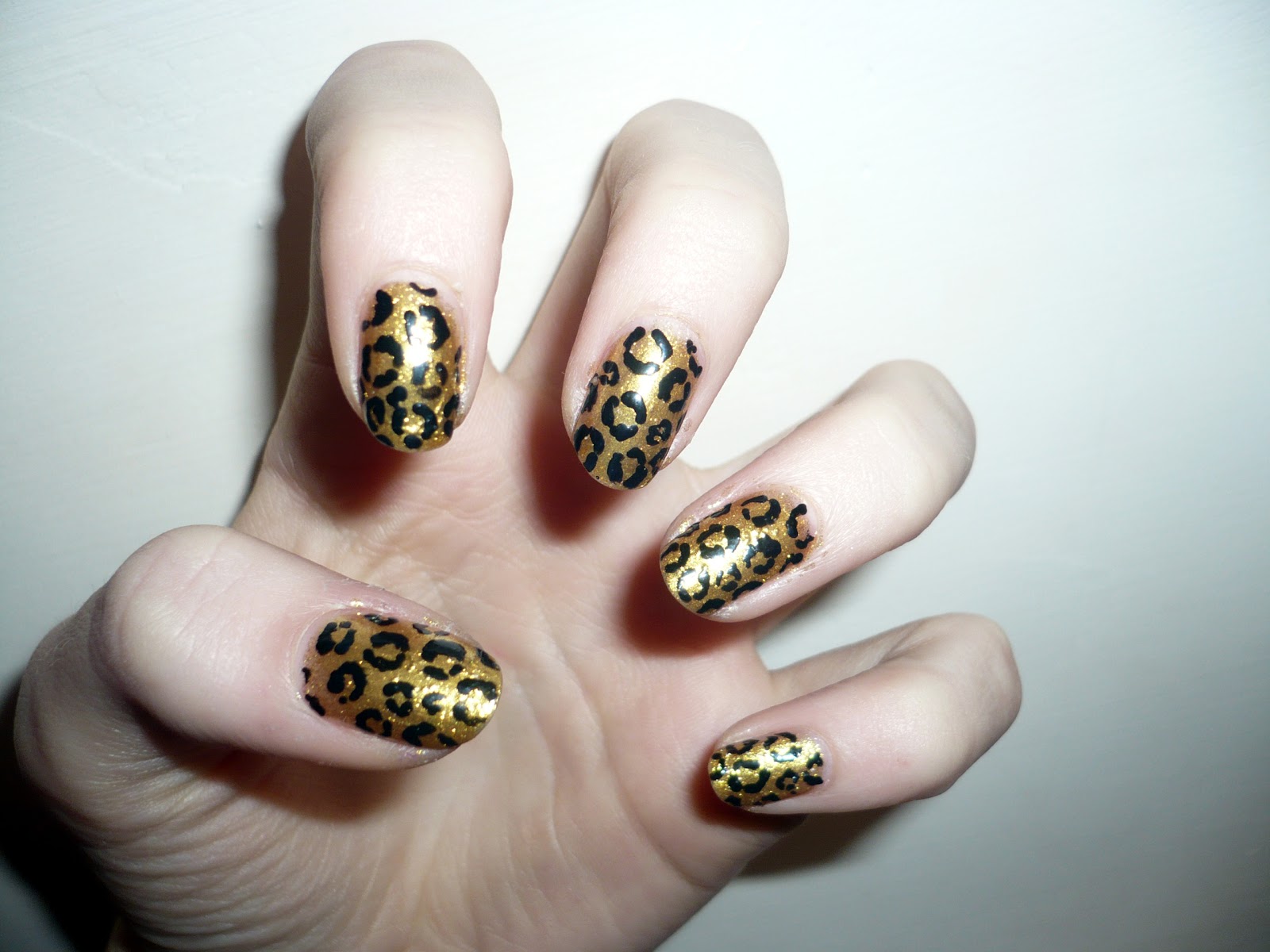 Black and gold leopard nail design - wide 7