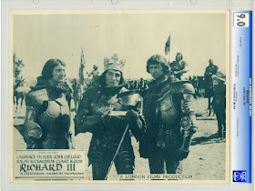 Lobby card of Laurence Olivier in armor and crown in Richard III movieloversreviews.filminspector.com