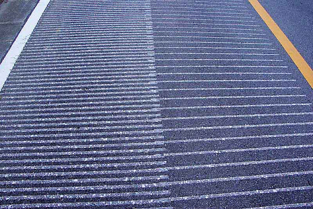 grooves cut in pavement for music