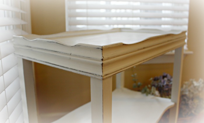 The edge of the table has a scalloped trim Scalloped edge