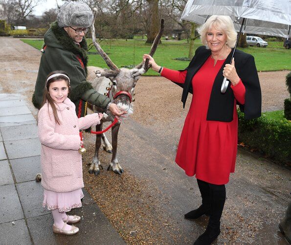 The Duchess of Cornwall is the patron of Helen and Douglas House and Roald Dahl Charity. red dress