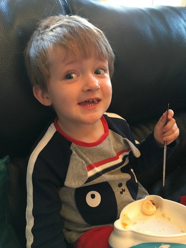 boy-grinning-and-eating-breakfast