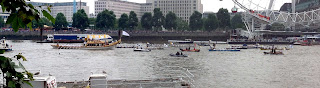 Royal Barge "Gloriana" carrying the Olympic Torch along the river Thames