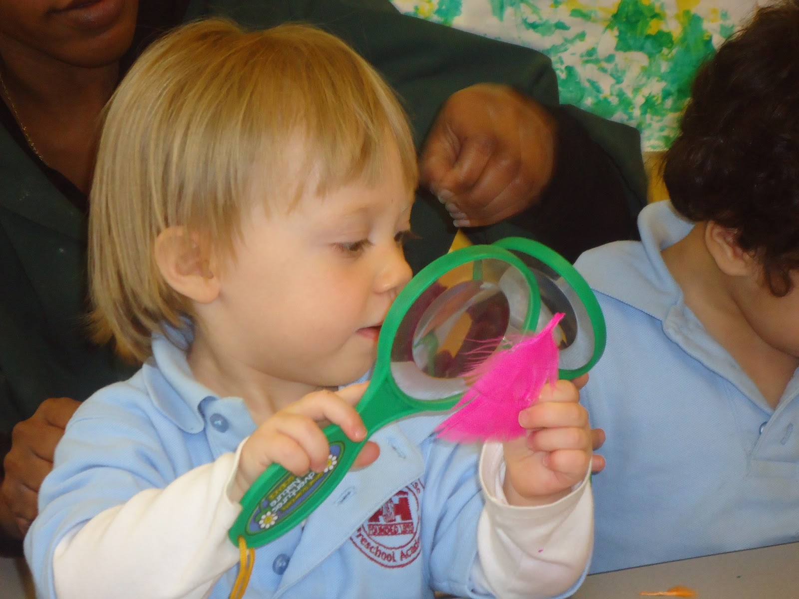 to the HH Toddler Classroom! Exploring Feathers with a