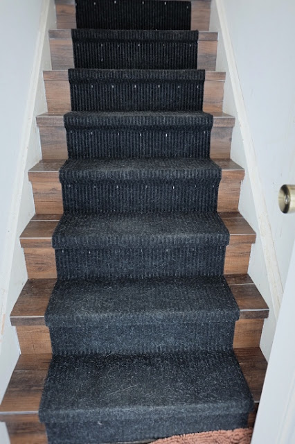 finished stairs with new runner
