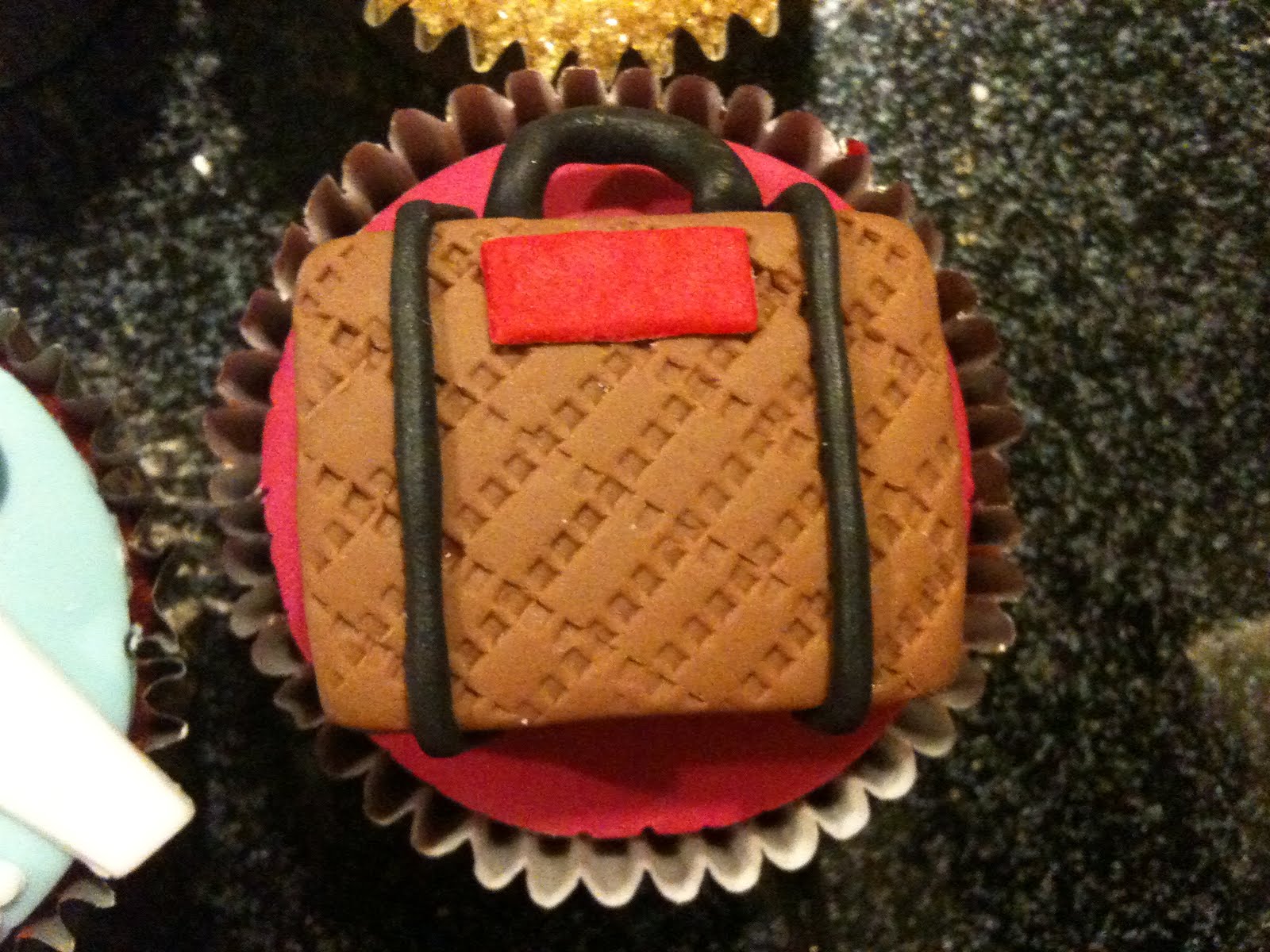 scrumptious homemade travel themed cupcakes