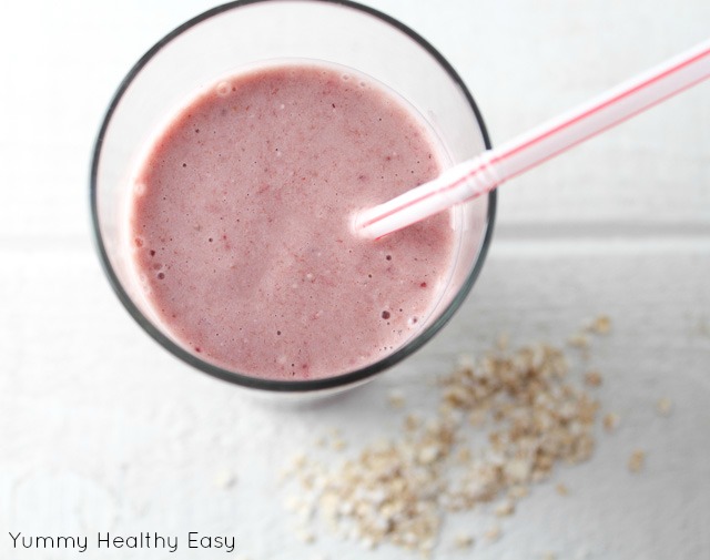 Over head photo of smoothie with oats in the background.