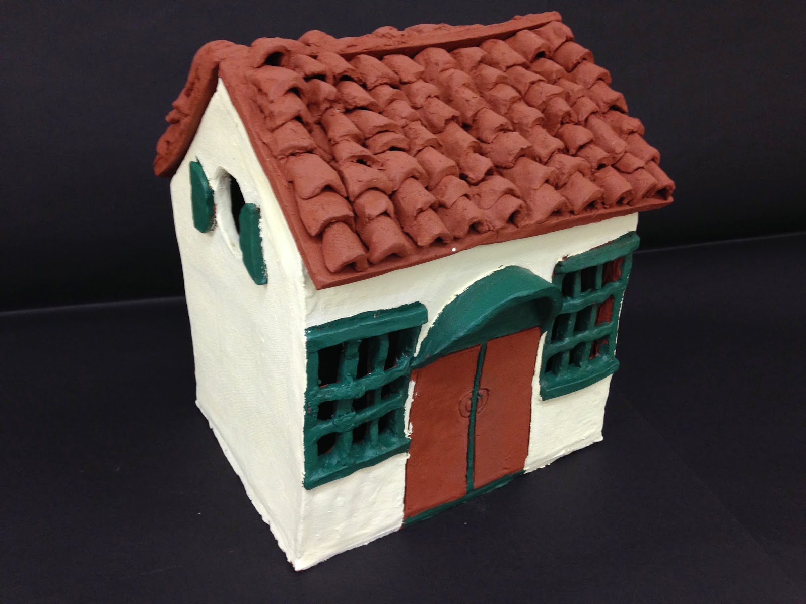 Kristen Applebee Painting Ceramic Houses