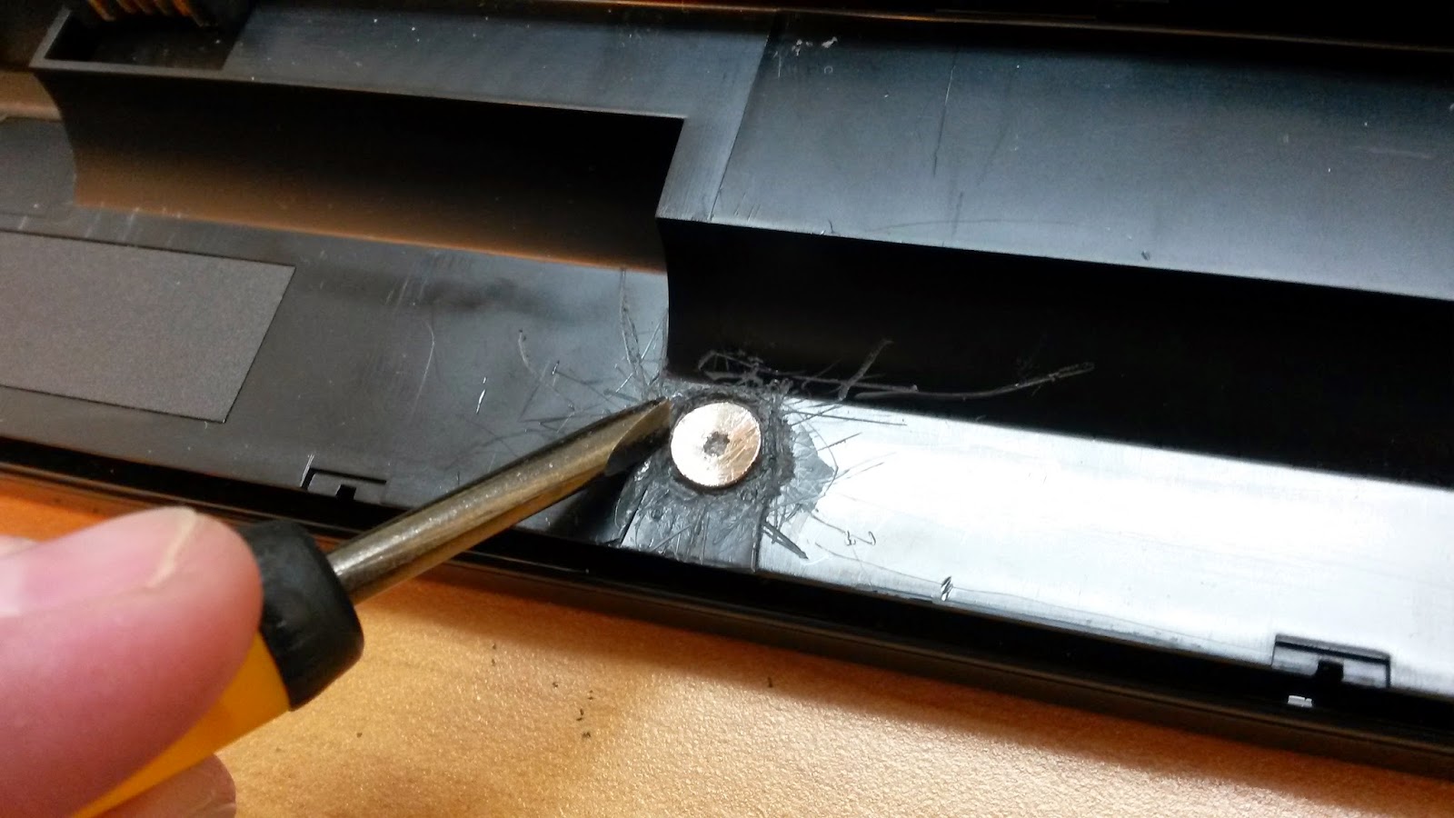 how to remove a rounded screw