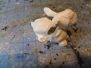 crafting armatures from papercraft animals setting detail location on paper clay sculpture