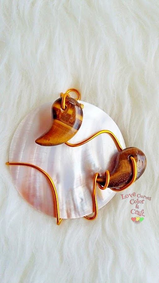 Collar-de-madre-perla-y-diente-de-tigre