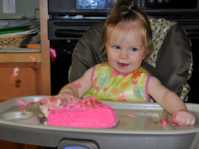 Birthday girl attacks pig cake