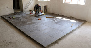 Bekir near the end of his tiling task Bekir near the end of his tiling task