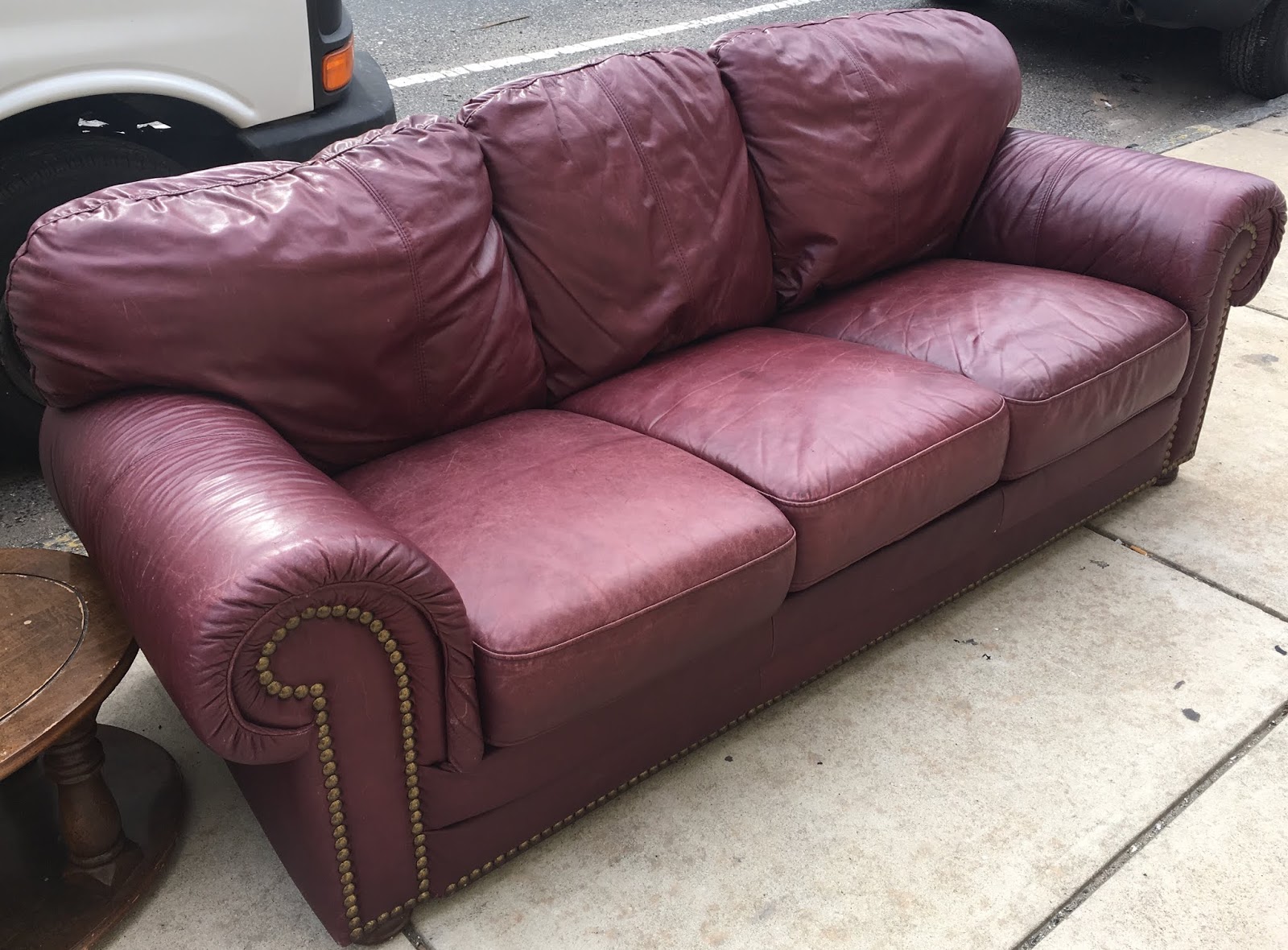 leather sofa with decorative nails
