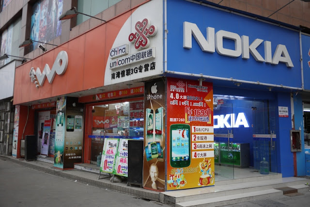 store with prominent signs for China Unicom and Nokia