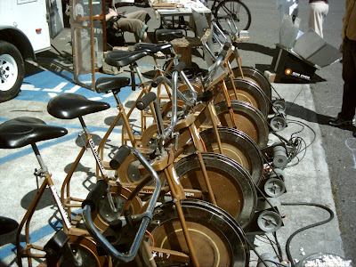 Electric Power Generator for bicycle electricity 12 VAC standard automobile battery charging system. photo by Gregory Vanderlaan/ Tour Northern California. Solar Oven CCAT Bart Orlando Samba Parade Humboldt State University Arcata California