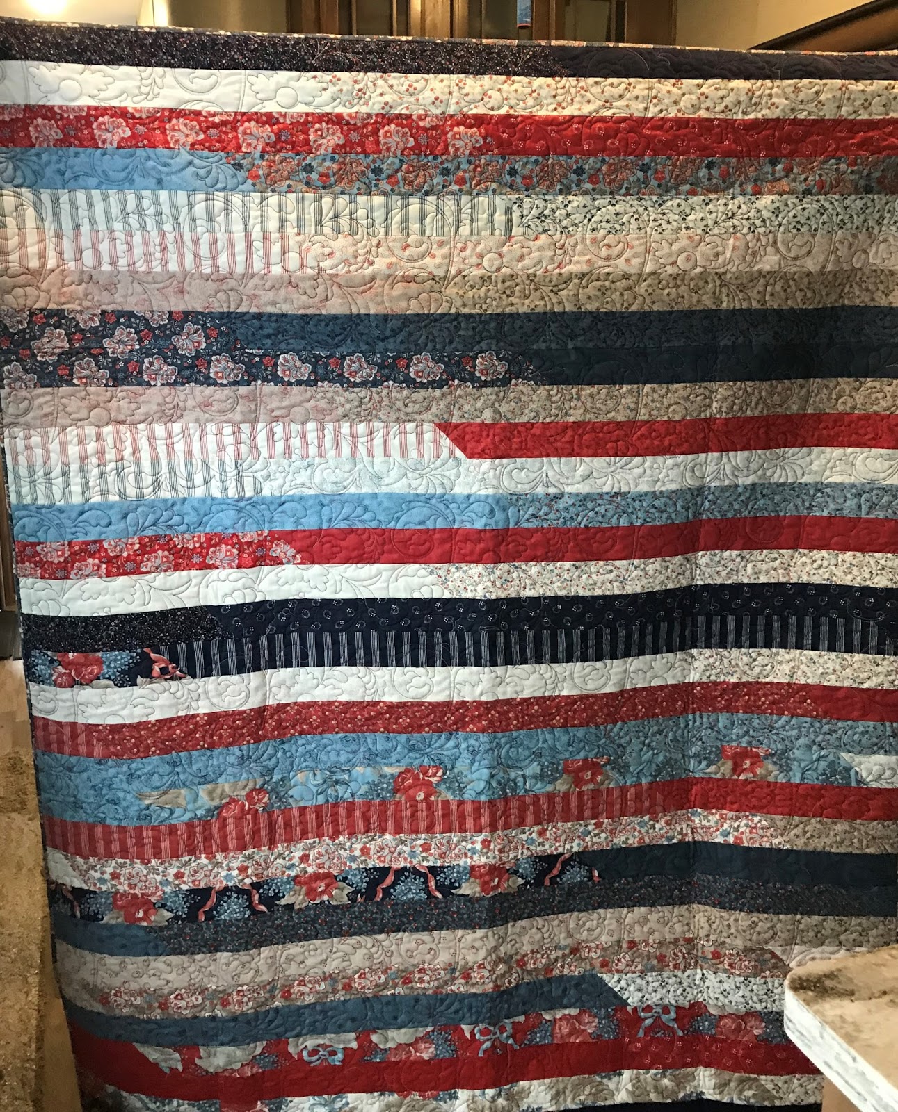 this first one is my grant park patriotic strippy quilt that i finished up in september and i quilted that up on october 3rd it measures 51 x 64 and has this first one is my grant park patriotic strippy quilt that i finished up in september and i quilted that up on october 3rd it measures 51 x 64 and has