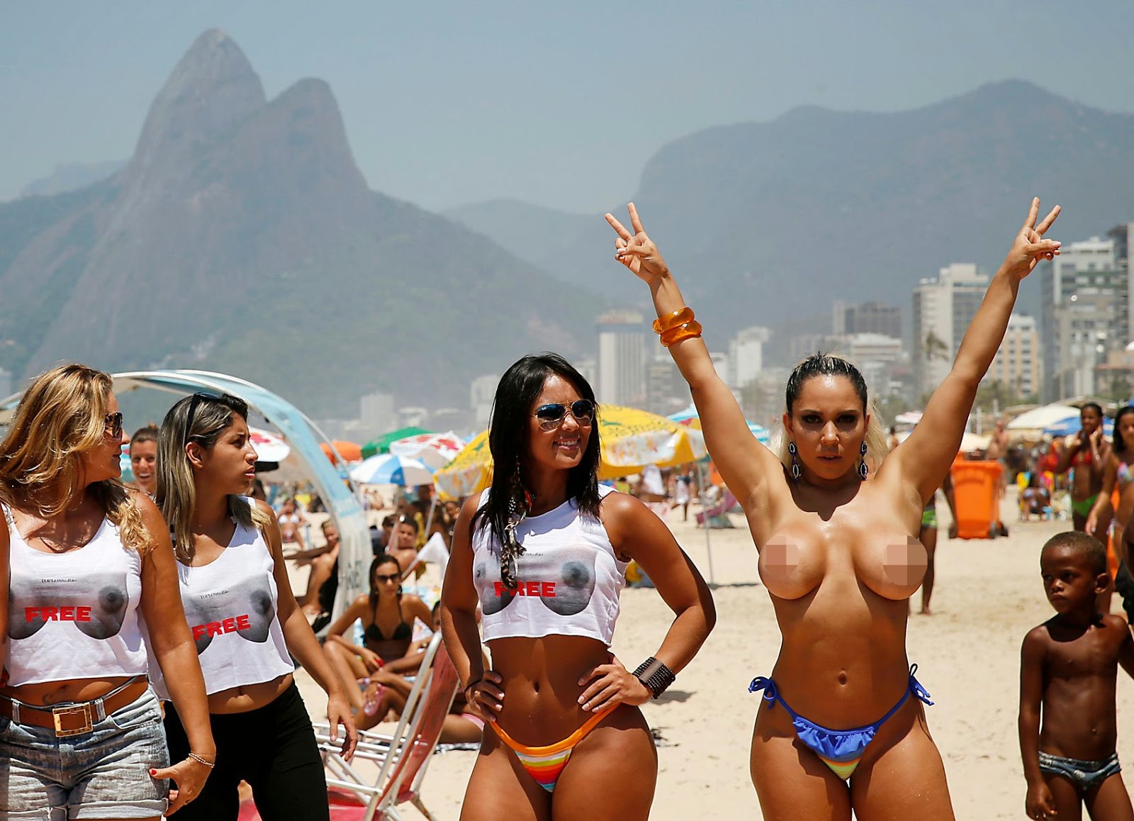 topless women protested on Rio de Janeiro's Ipanema beach to demand th...