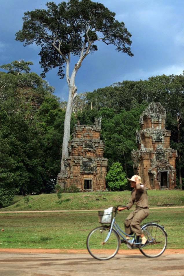One of the most overwhelmingly sacred places on Earth is Angkor, Cambodia. And you can spend days among the ruins of the ancient Khmer temples by riding a cheap rented bike. - 18 Amazing Places You Should Ride Your Bike Before You Die