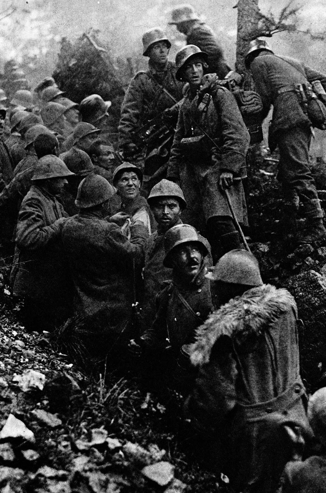 Captured Italian soldiers are escorted to the rear by German soldiers during the Battle of Caporetto, 1917