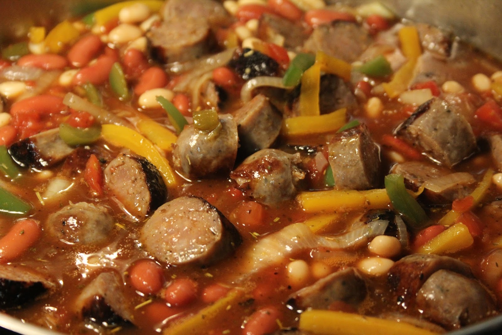 sausage peppers and onions over rice