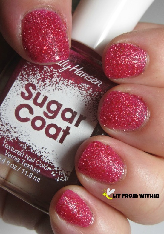 Sally Hansen Sugar Coat in Pink Sprinkle - a fun, bright, lightly sparkly pinky-red