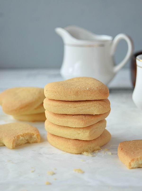 Delicious melt in your mouth shortbread cookies piled on top of each other
