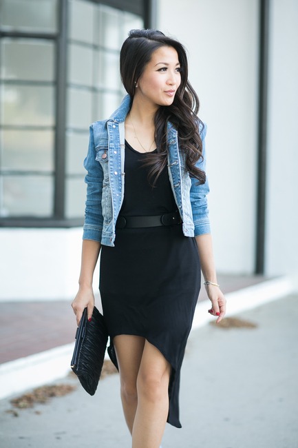 Street style | Asymmetrical black dress with denim jacket | Just a ...